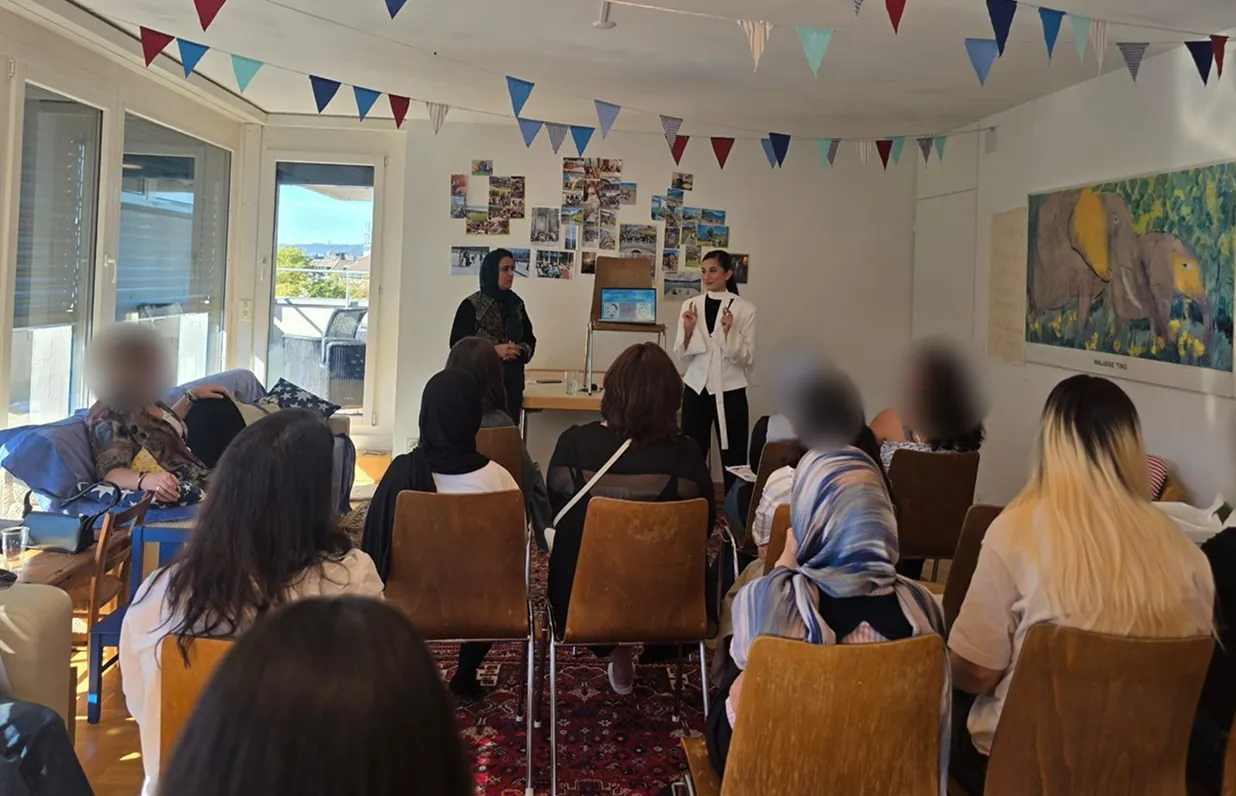 Your Body Matters workshop: two speakers in front of a group of women